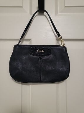 Coach Black Leather Wristlet Clutch with Gold Tone Hardware